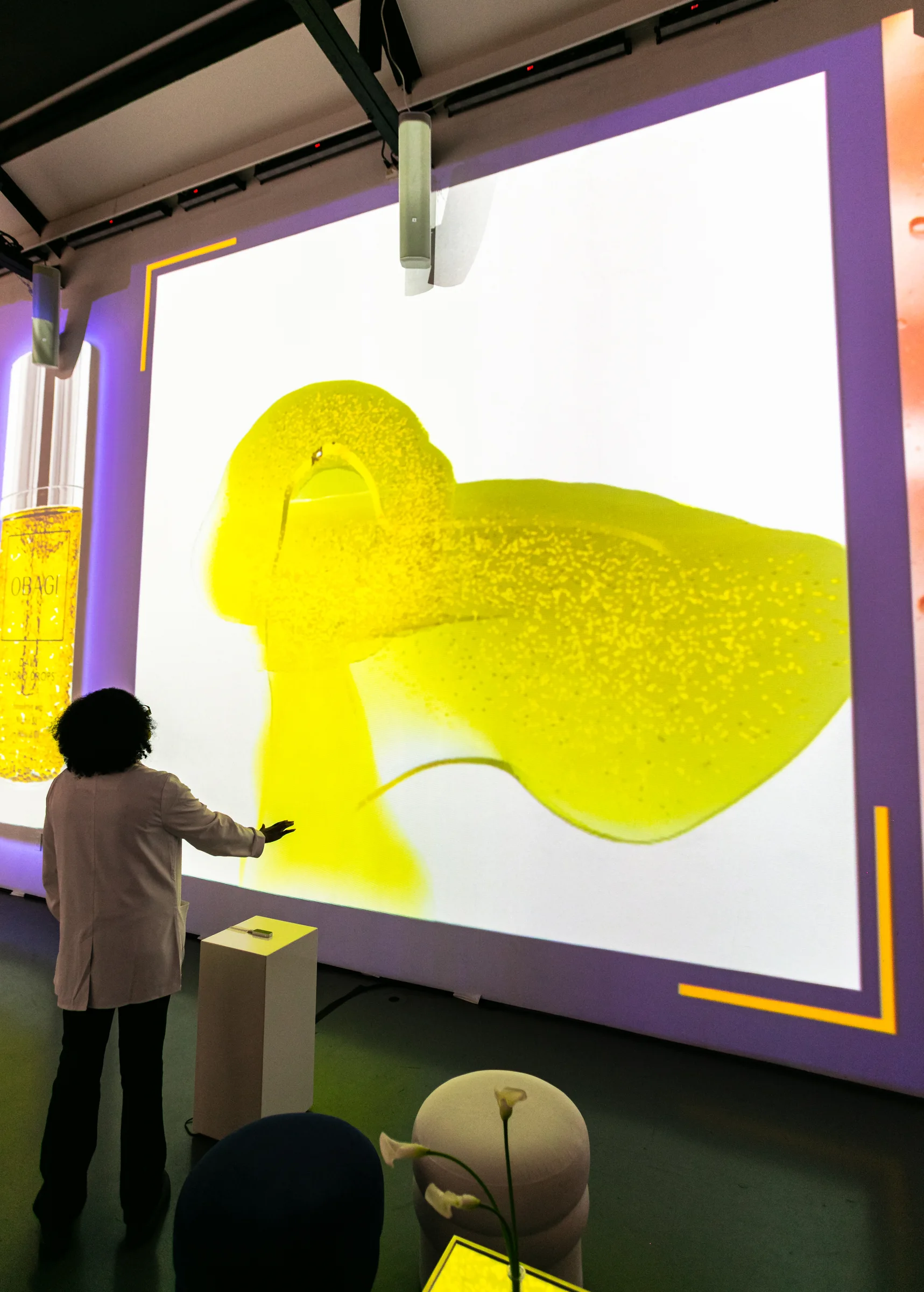 Projection mapped Obagi wall interaction in immersive room